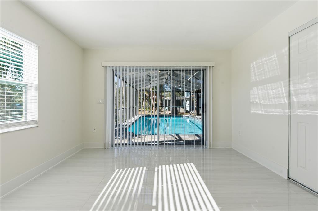 4346 Marine Parkway New Port Richey, FL 34652 - Photo 39 of 51 an entryway of a house with wooden floor