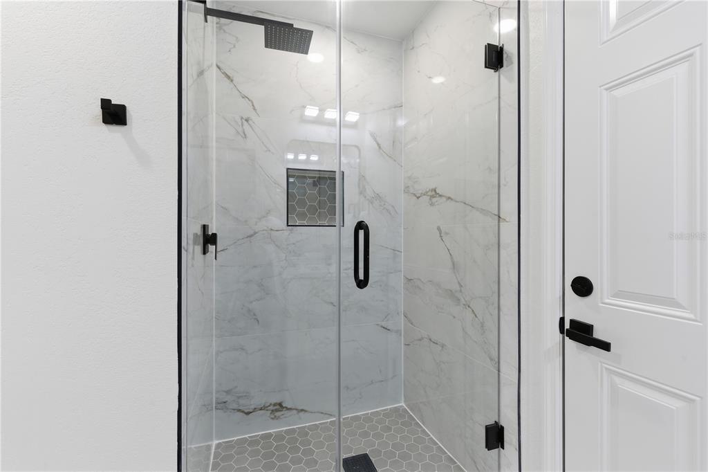 4346 Marine Parkway New Port Richey, FL 34652 - Photo 41 of 51 a bathroom with a shower