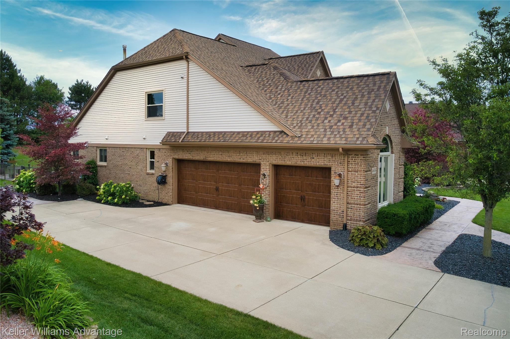 48436 Gladstone Road Canton, MI 48188 - Photo 3 of 41 3 Car Garage - Beautiful New Doors!