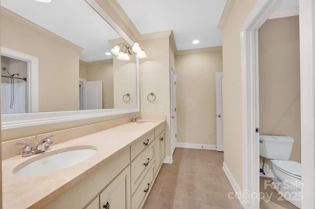 a bathroom with a shower and a toilet