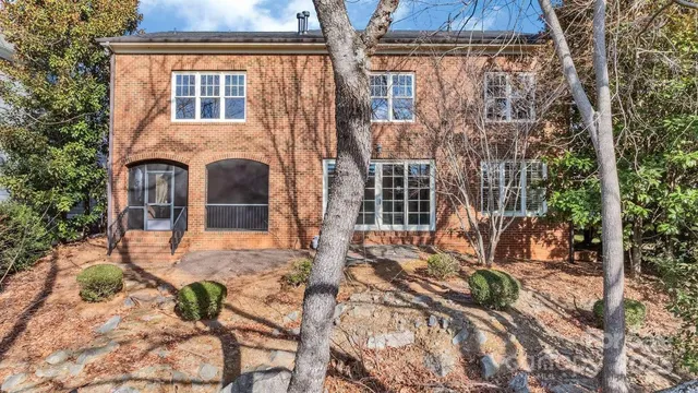 a backyard of a house with lots of green space