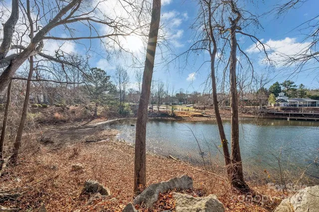 a view of swimming pool with seating space