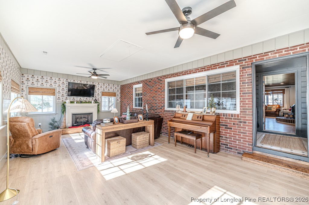 179 Sunset Hills Road Robbins, NC 27325 - Photo 16 of 31 a living room with furniture large window and kitchen view
