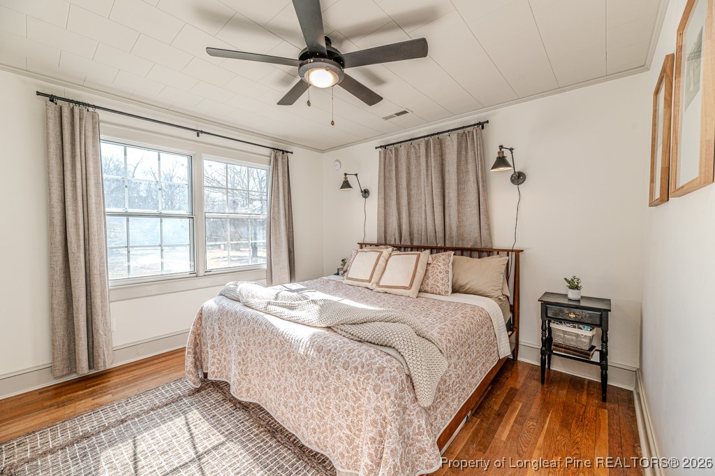 179 Sunset Hills Road Robbins, NC 27325 - Photo 18 of 31 a large bed sitting in a bedroom next to a window