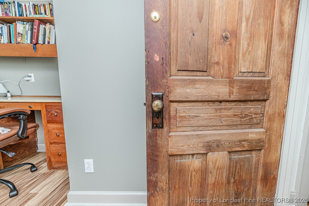 179 Sunset Hills Road Robbins, NC 27325 - Photo 25 of 31 a bathroom with a granite countertop sink and a mirror