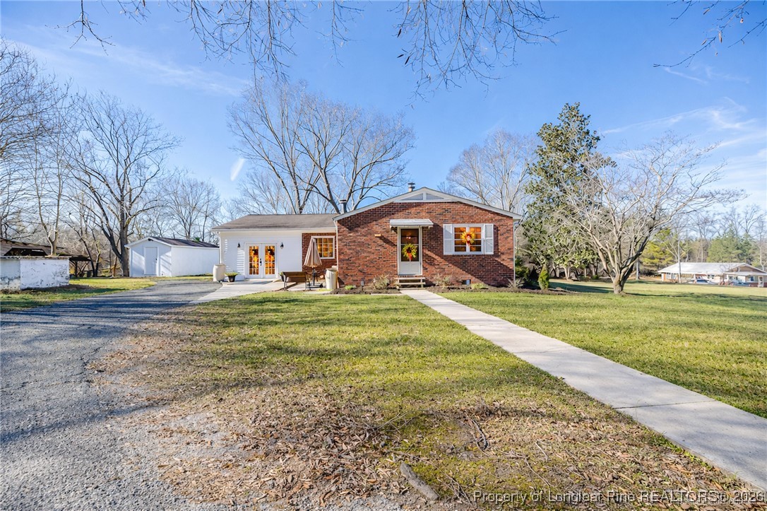 179 Sunset Hills Road Robbins, NC 27325 - Photo 31 of 31 a house with garden view