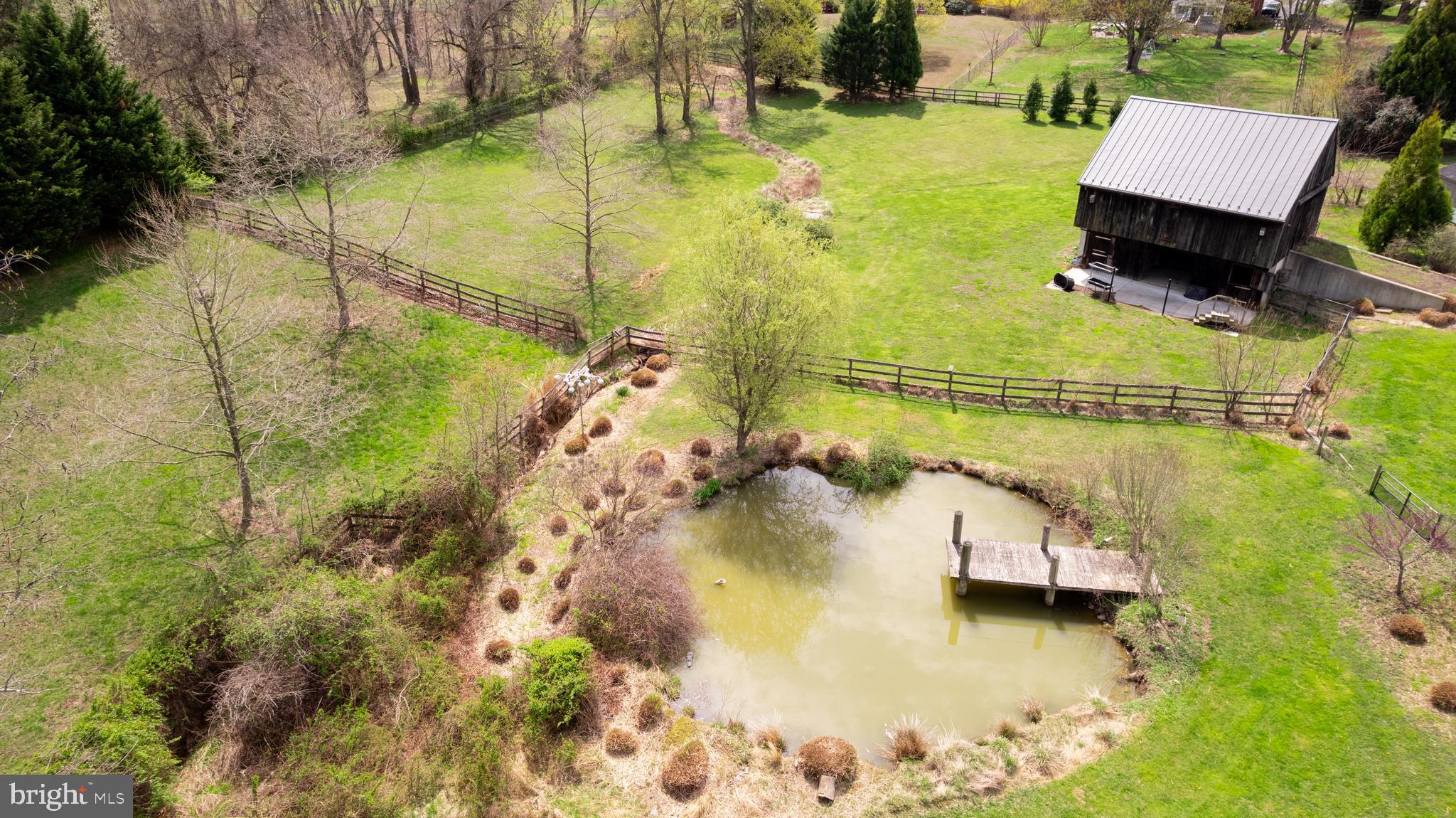 5727 Telegraph Road Elkton, MD 21921 - Photo 17 of 93 a swimming pool with some trees in the background