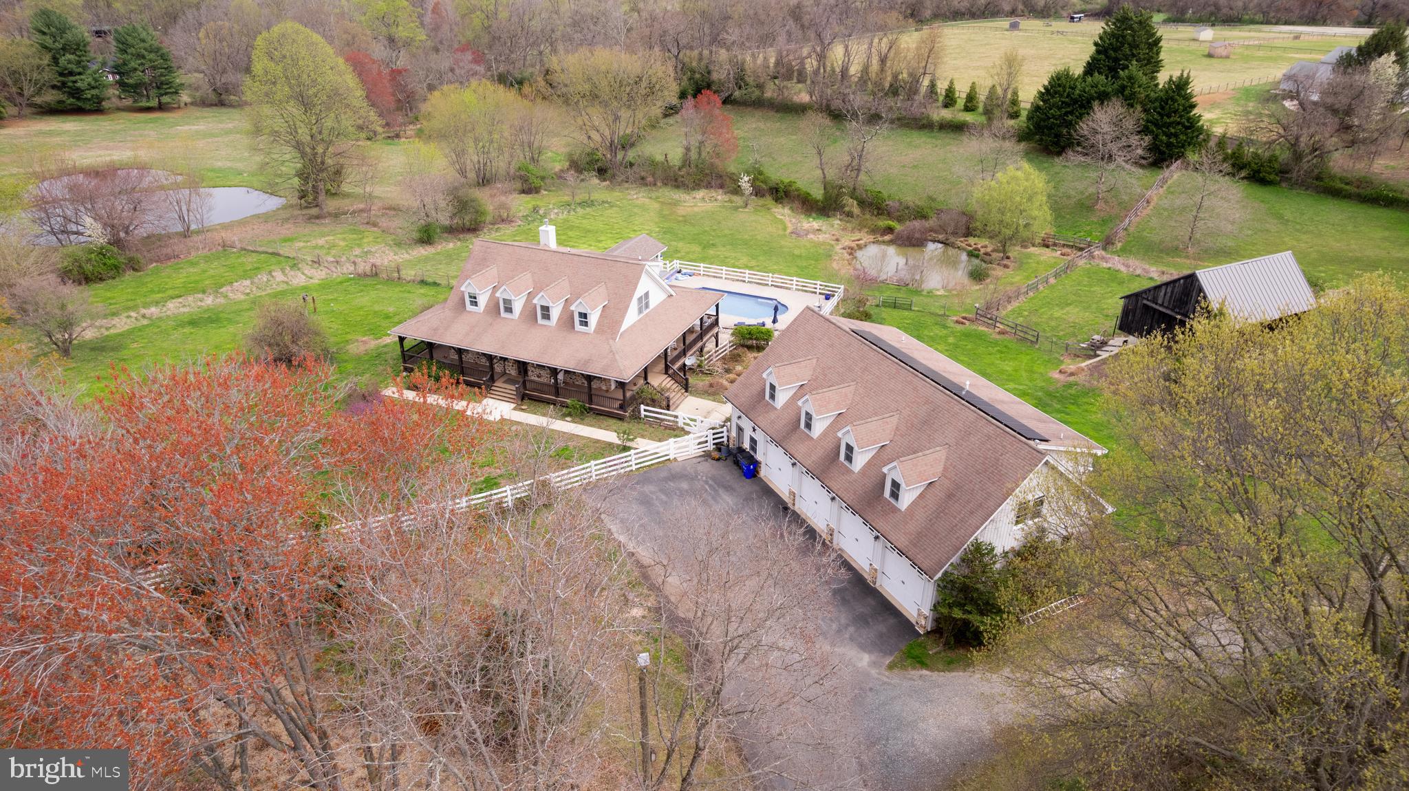 5727 Telegraph Road Elkton, MD 21921 - Photo 21 of 93 an aerial view of a house with garden space and lake view