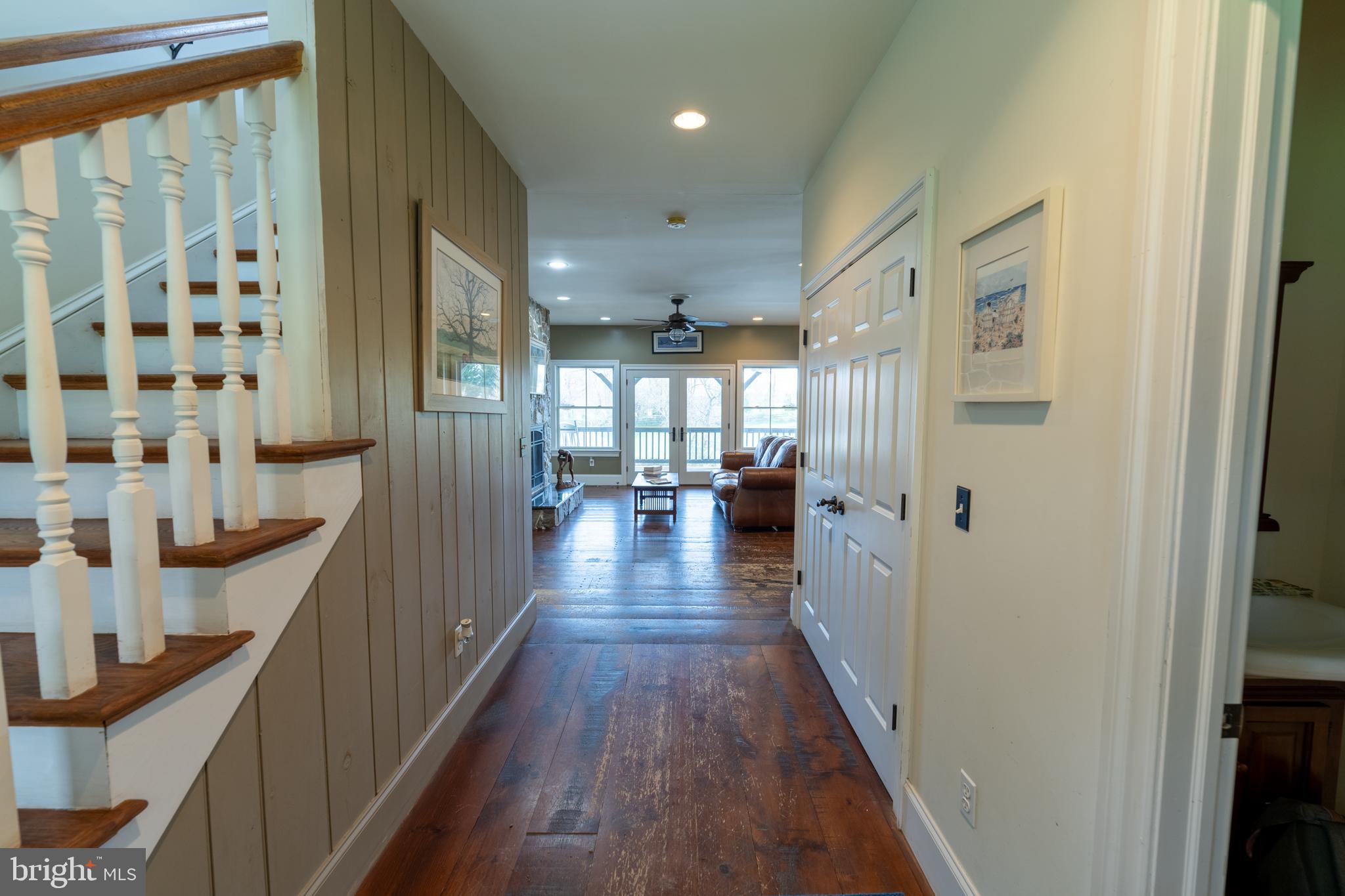 5727 Telegraph Road Elkton, MD 21921 - Photo 36 of 93 a view of a hallway with wooden floor and windows