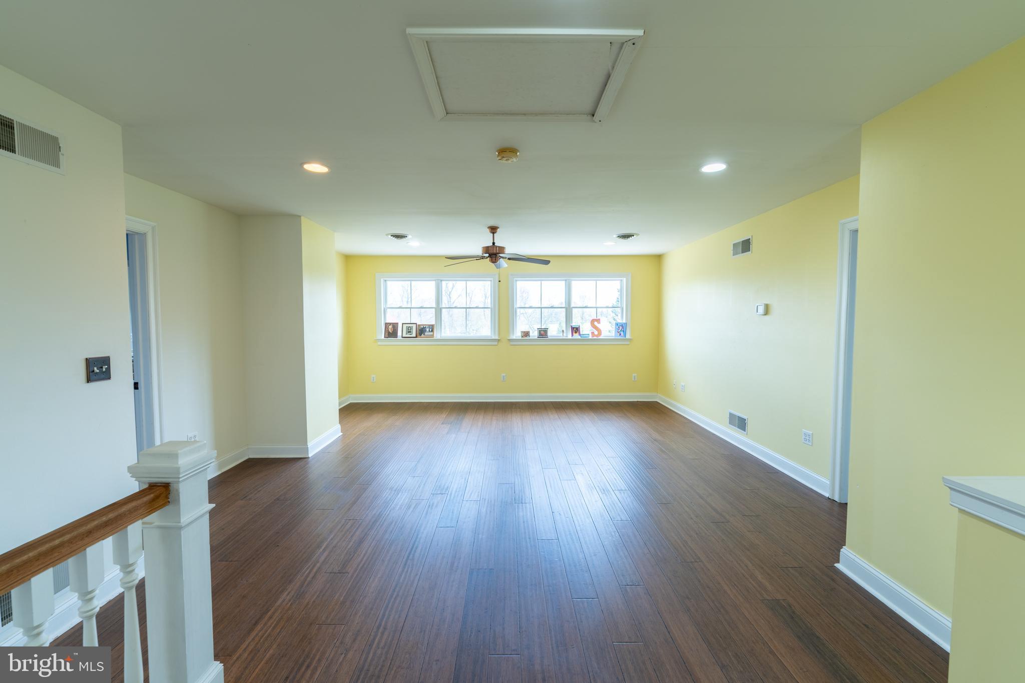 5727 Telegraph Road Elkton, MD 21921 - Photo 49 of 93 a view of empty room with wooden floor and fan