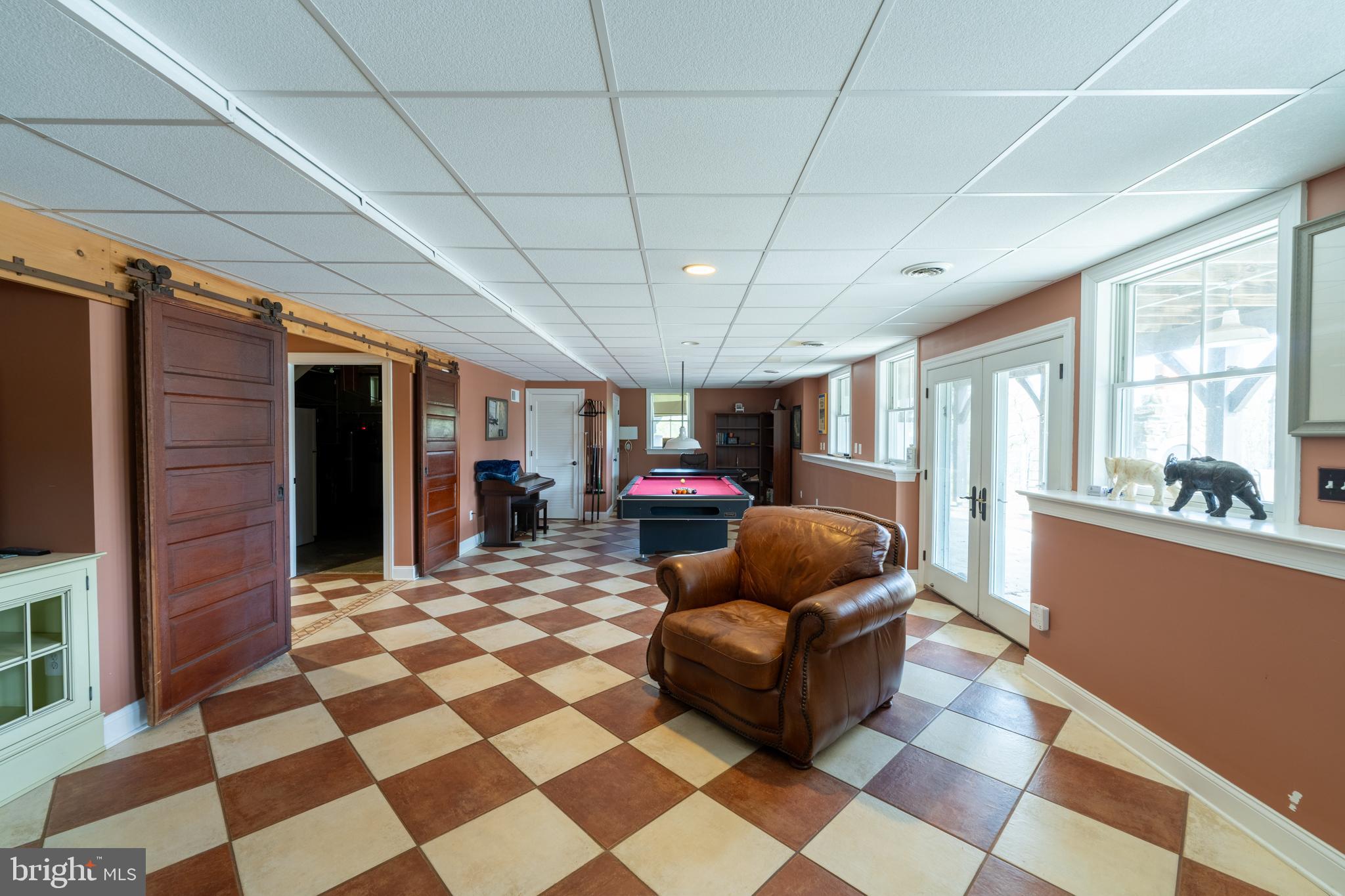 5727 Telegraph Road Elkton, MD 21921 - Photo 52 of 93 a living room with furniture and a flat screen tv