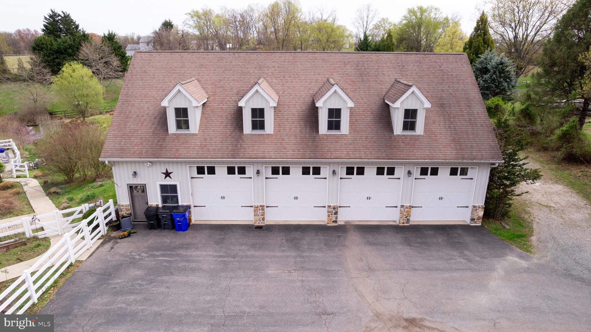 5727 Telegraph Road Elkton, MD 21921 - Photo 87 of 93 a view of a white house with a big yard and large trees