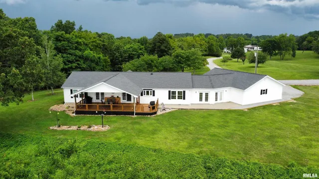 an aerial view of a house with garden