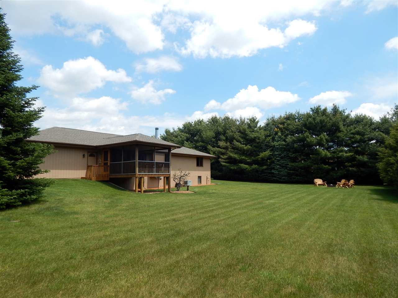 4259 Montclair Road Roscoe, IL 61073 - Photo 2 of 25 a view of a house with a backyard