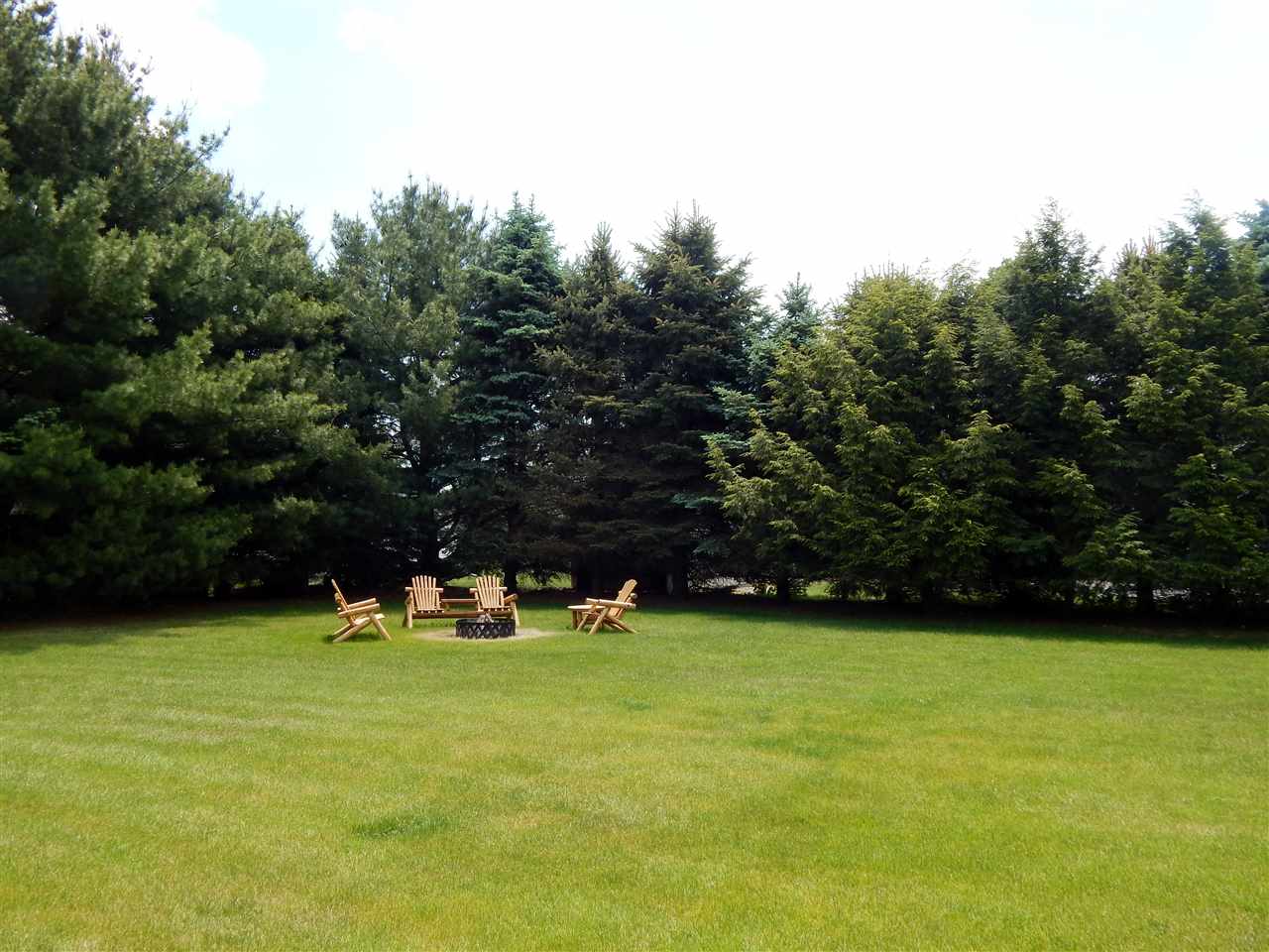 4259 Montclair Road Roscoe, IL 61073 - Photo 22 of 25 a view of yard with grass and a trees