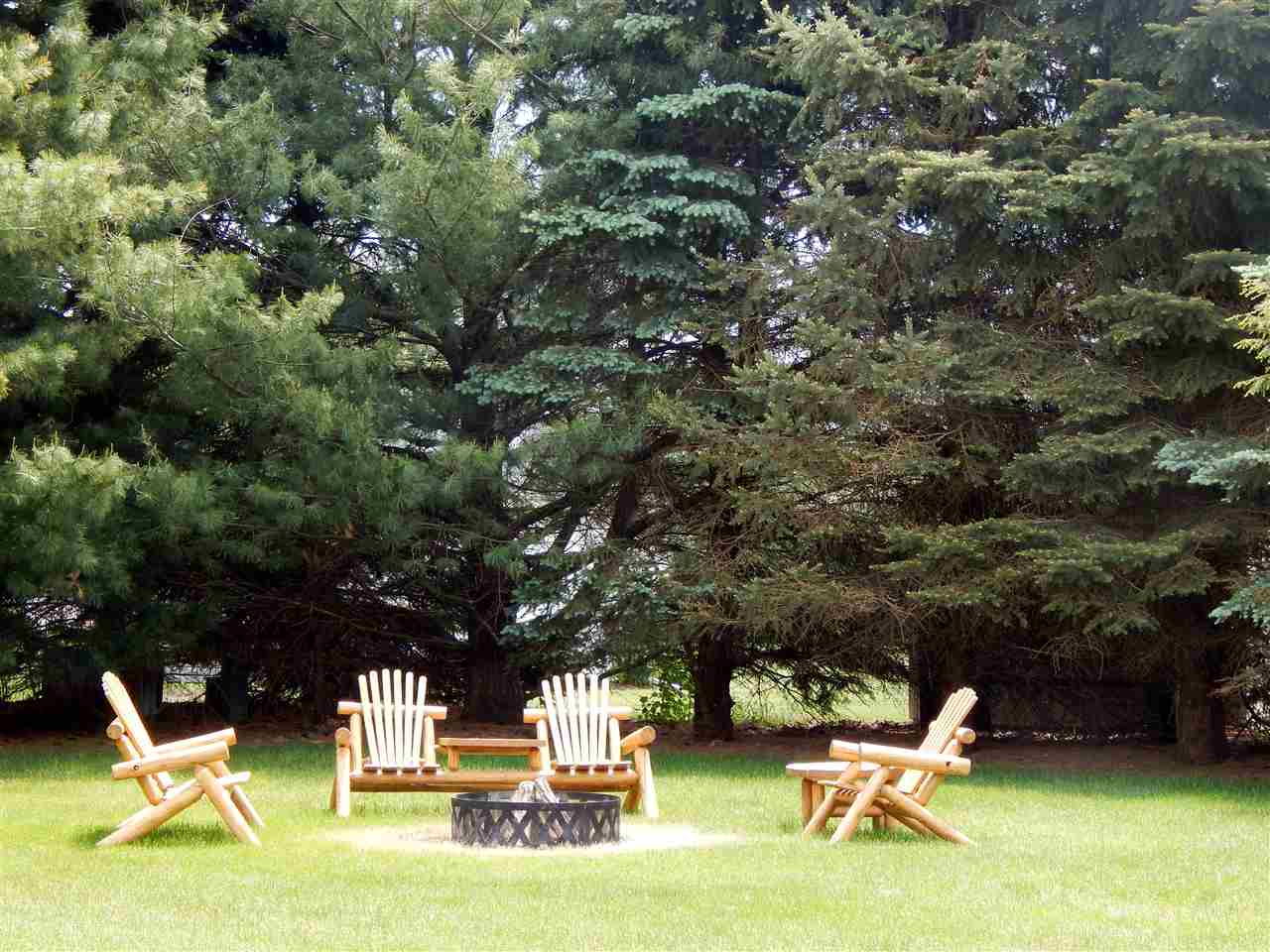 4259 Montclair Road Roscoe, IL 61073 - Photo 23 of 25 a view of yard with swimming pool and sitting area