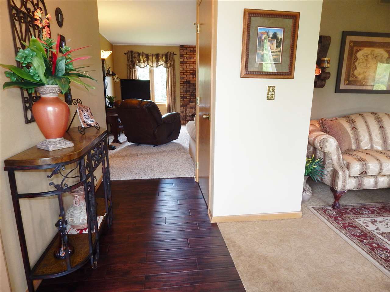 4259 Montclair Road Roscoe, IL 61073 - Photo 4 of 25 a view of a living room and filled with furniture