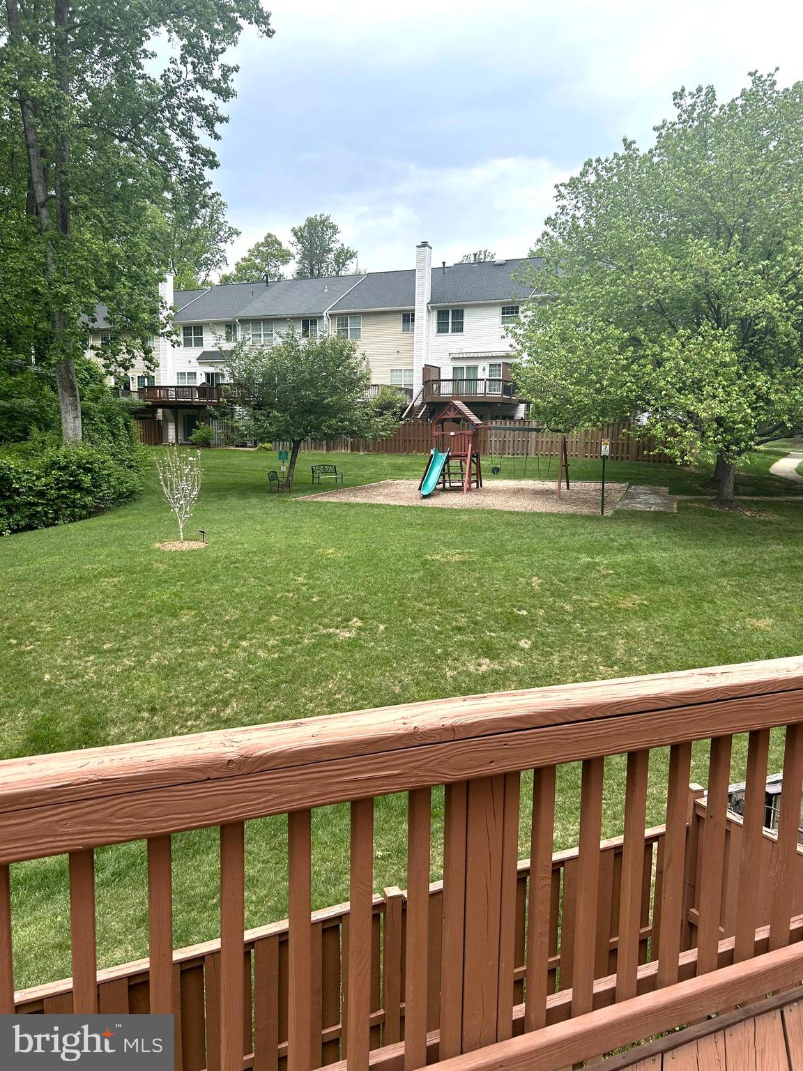 4658 Buckhorn Ridge Fairfax, VA 22030 - Photo 35 of 35 a view of a wooden deck and garden