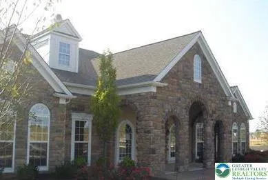 a brick building with a large windows