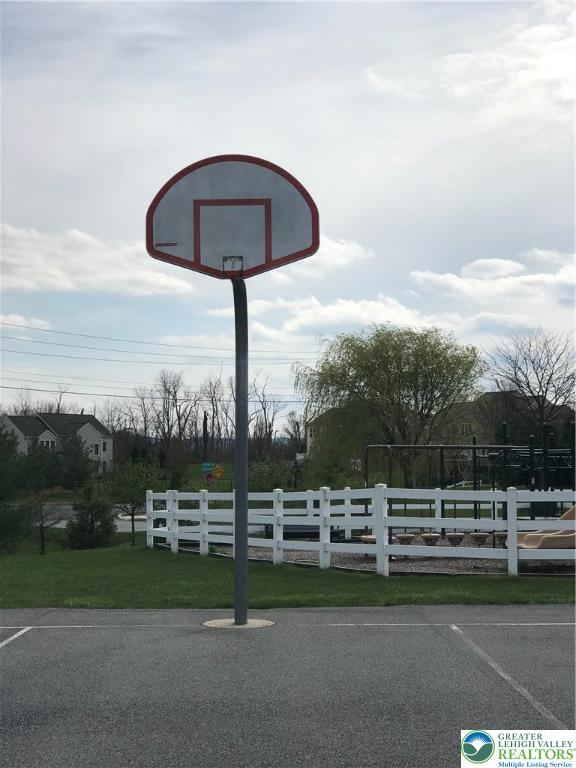 8514 Gateway Road Breinigsville, PA 18031 - Photo 18 of 23 a view of swimming pool from lake view