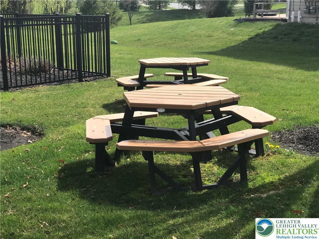 8514 Gateway Road Breinigsville, PA 18031 - Photo 23 of 23 a view of a table and chairs in the garden