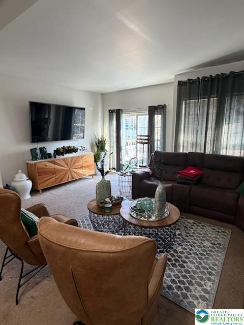 8514 Gateway Road Breinigsville, PA 18031 - Photo 3 of 23 a living room with furniture and a flat screen tv