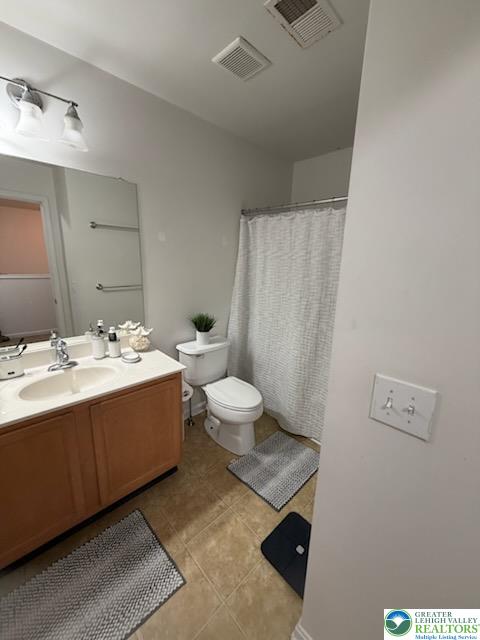 8514 Gateway Road Breinigsville, PA 18031 - Photo 8 of 23 a bathroom with a sink mirror and toilet