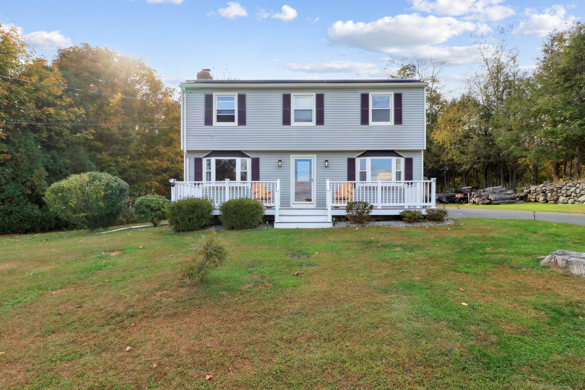 196 Center Street Hartland, CT 06091 - Photo 1 of 1 a front view of a house with a yard