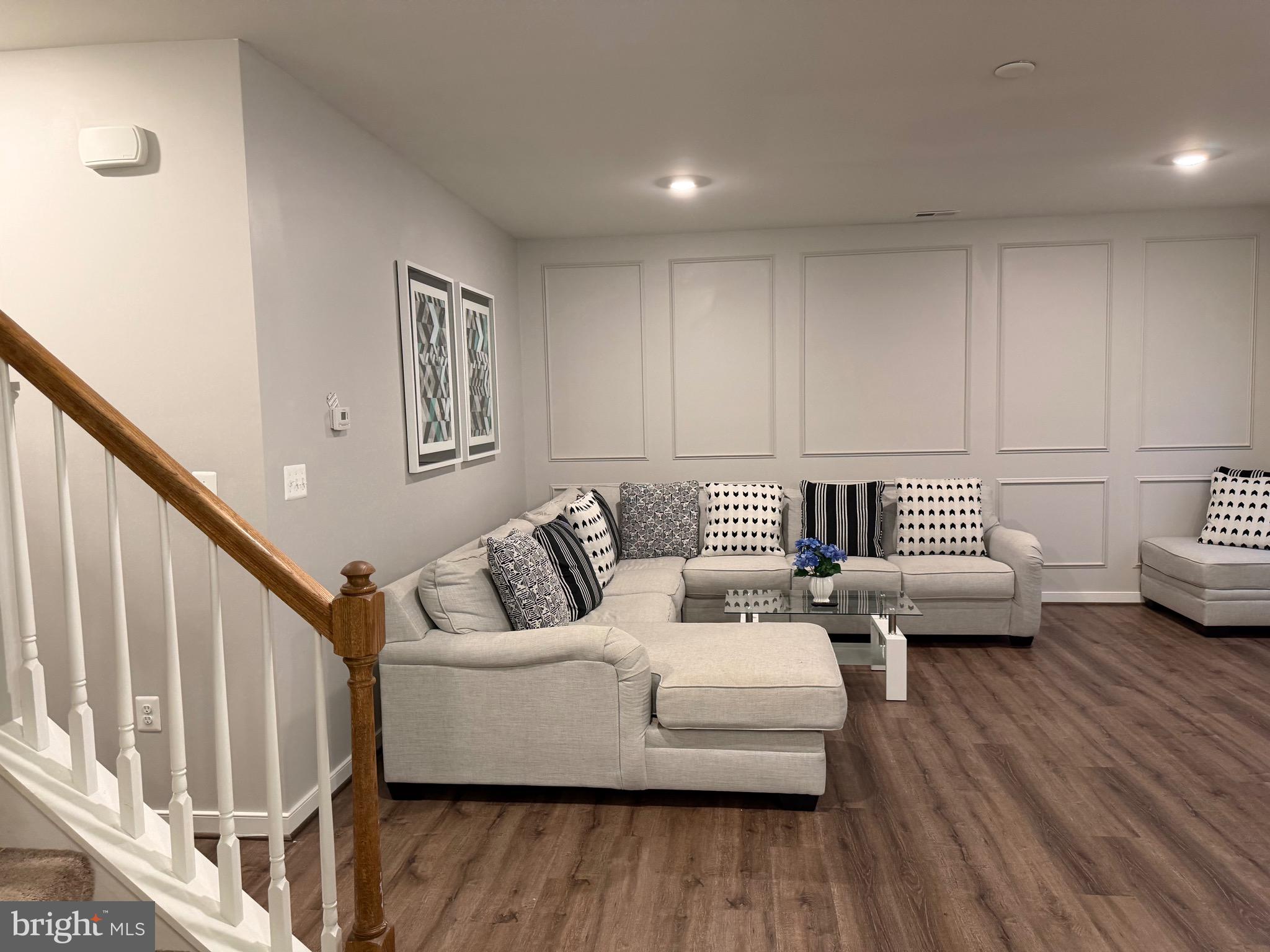 229 Bibb Street Louisa, VA 23093 - Photo 15 of 72 a living room with furniture and wooden floor
