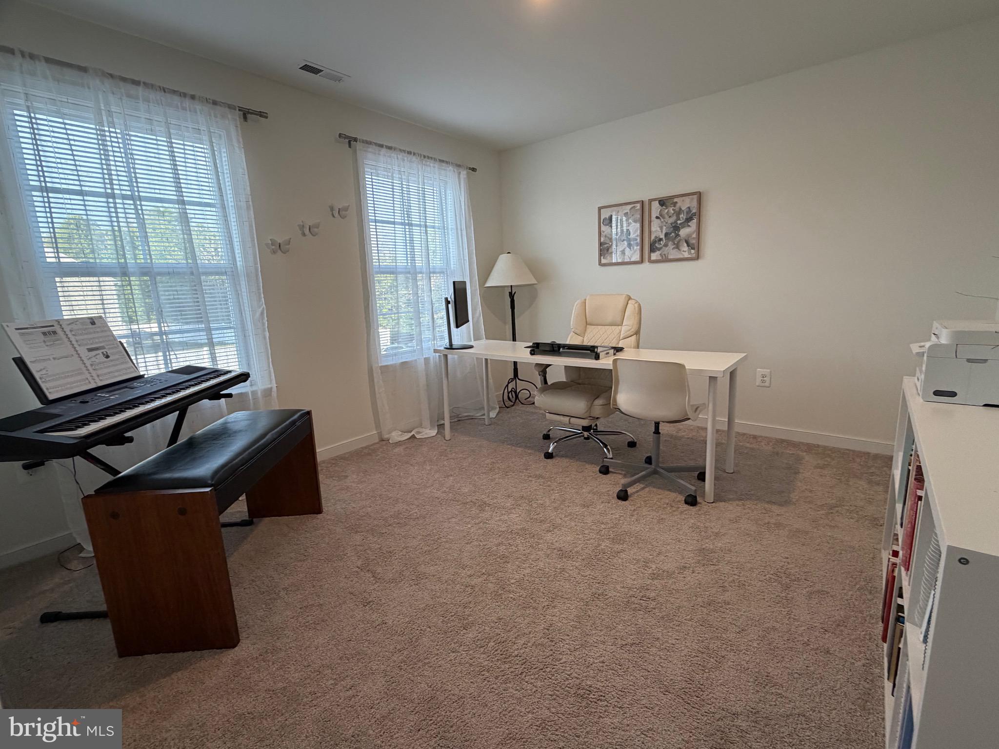 229 Bibb Street Louisa, VA 23093 - Photo 56 of 72 a living room with furniture and a window