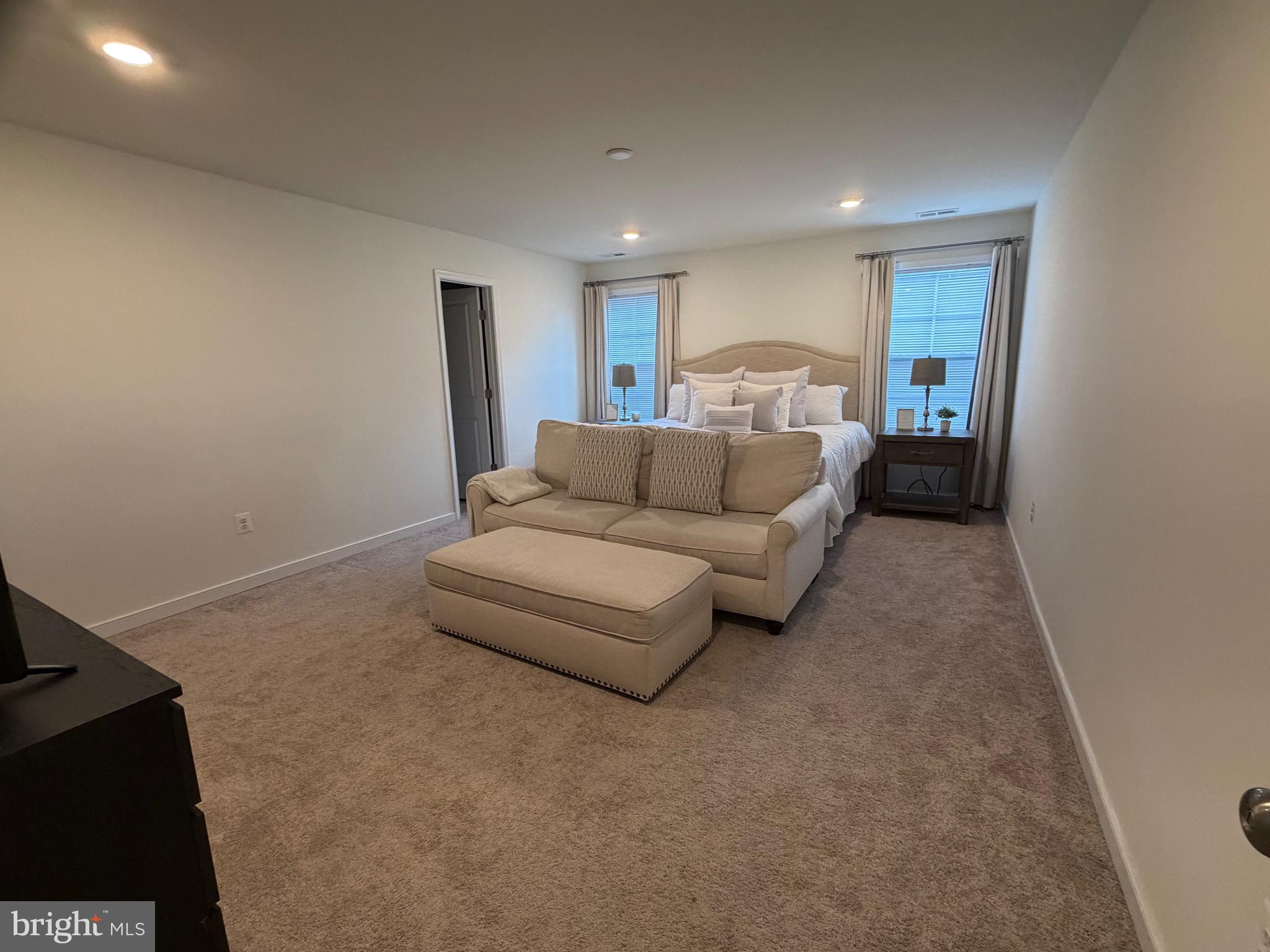 229 Bibb Street Louisa, VA 23093 - Photo 60 of 72 a living room with furniture and a walk in closet