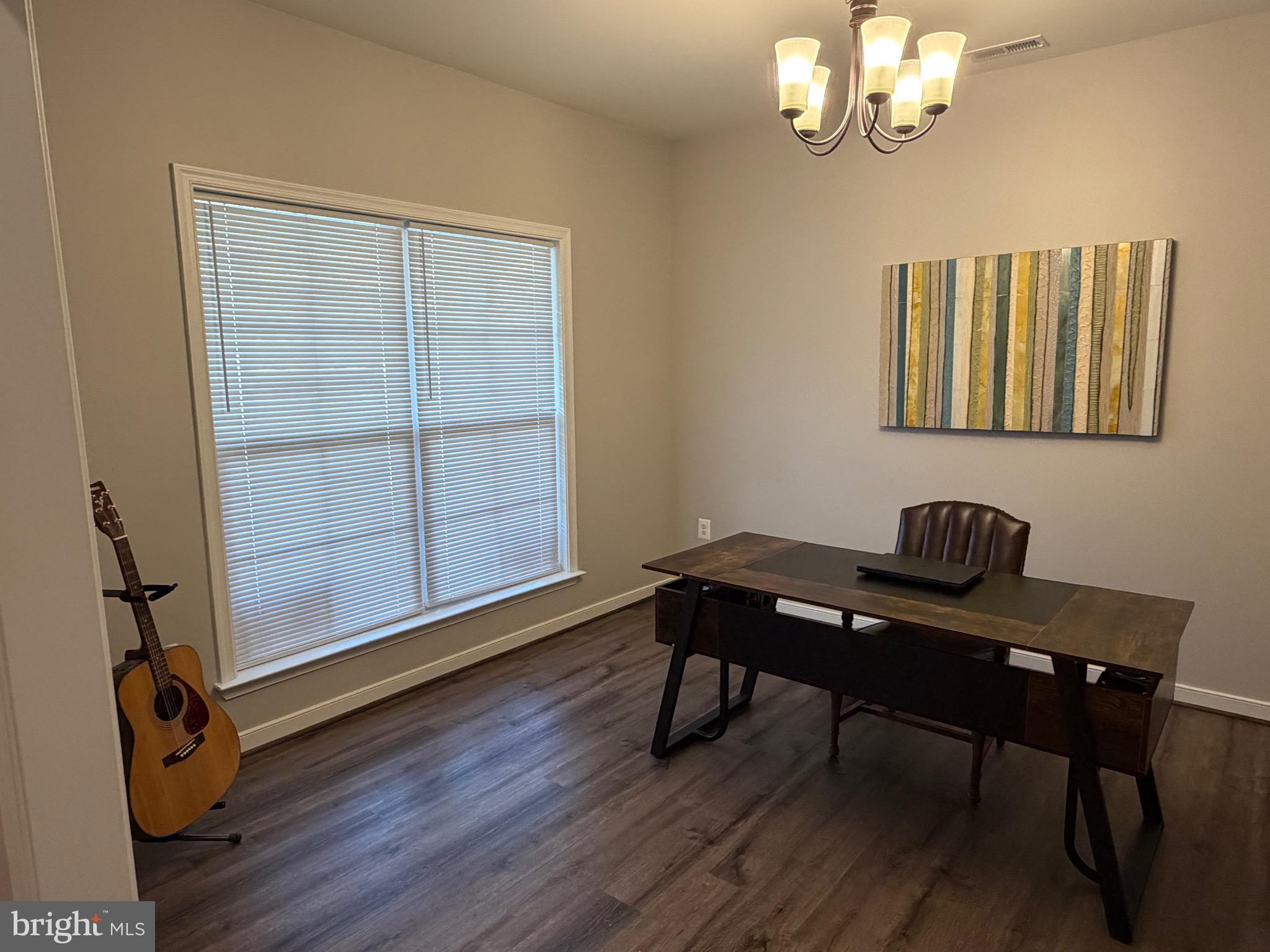 229 Bibb Street Louisa, VA 23093 - Photo 7 of 72 a view of a workspace with furniture and a window