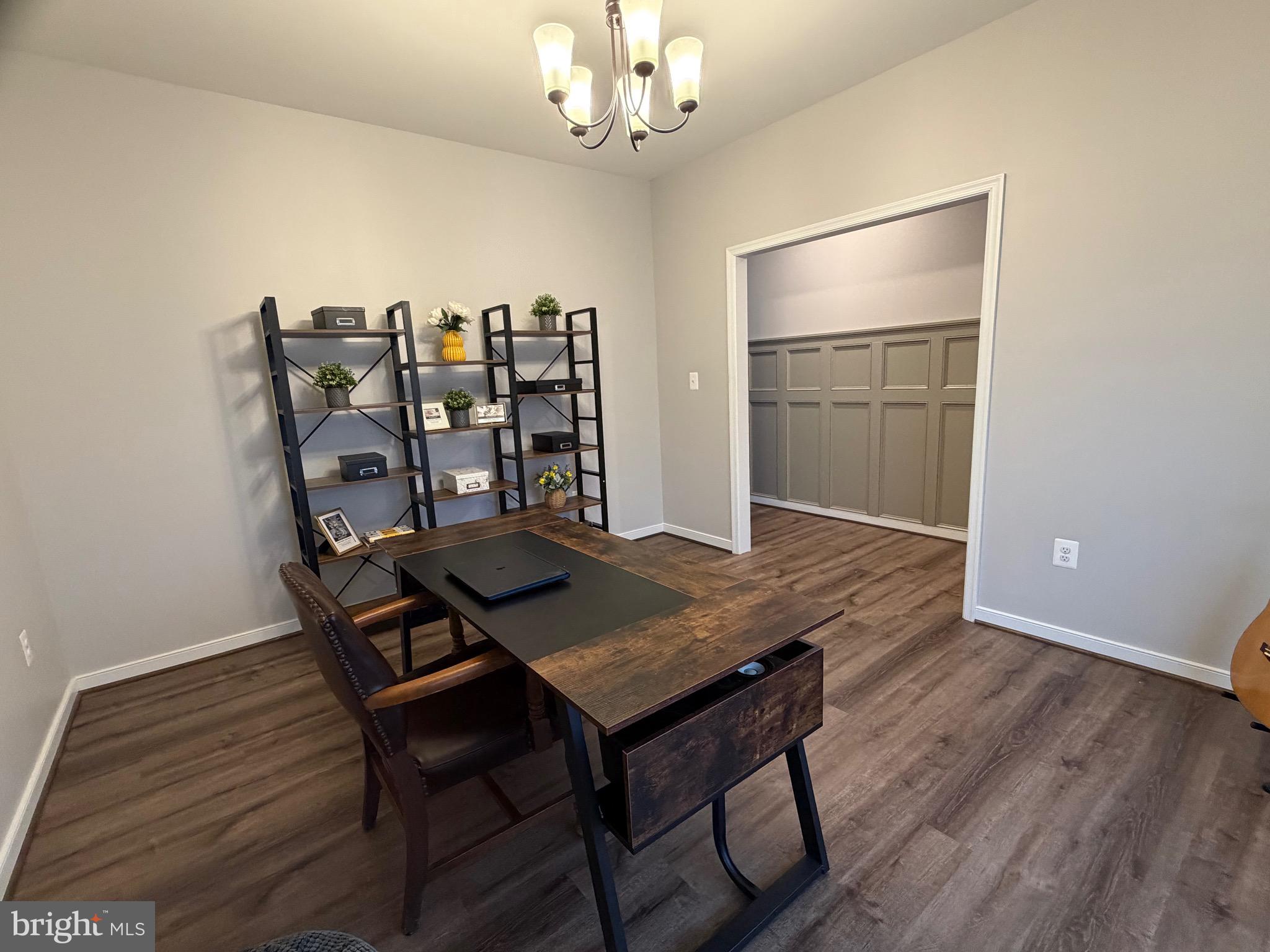 229 Bibb Street Louisa, VA 23093 - Photo 9 of 72 a view of a dining room with furniture and chandelier