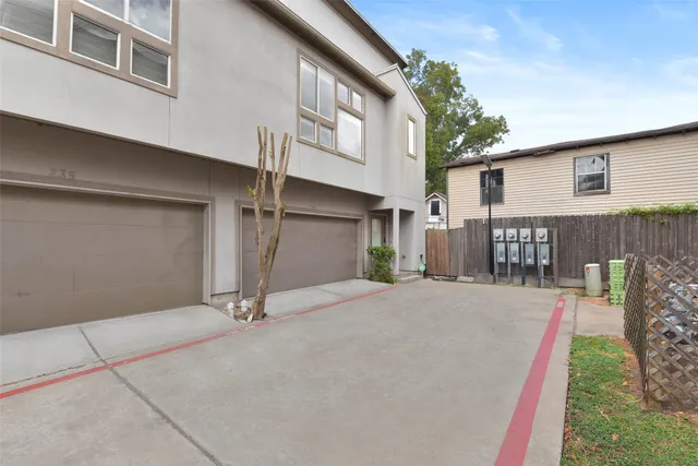 a view of a house with a garage