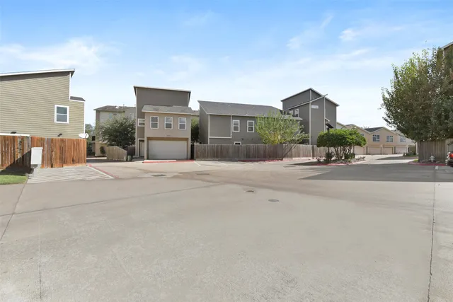 a front view of a house with a outdoor space