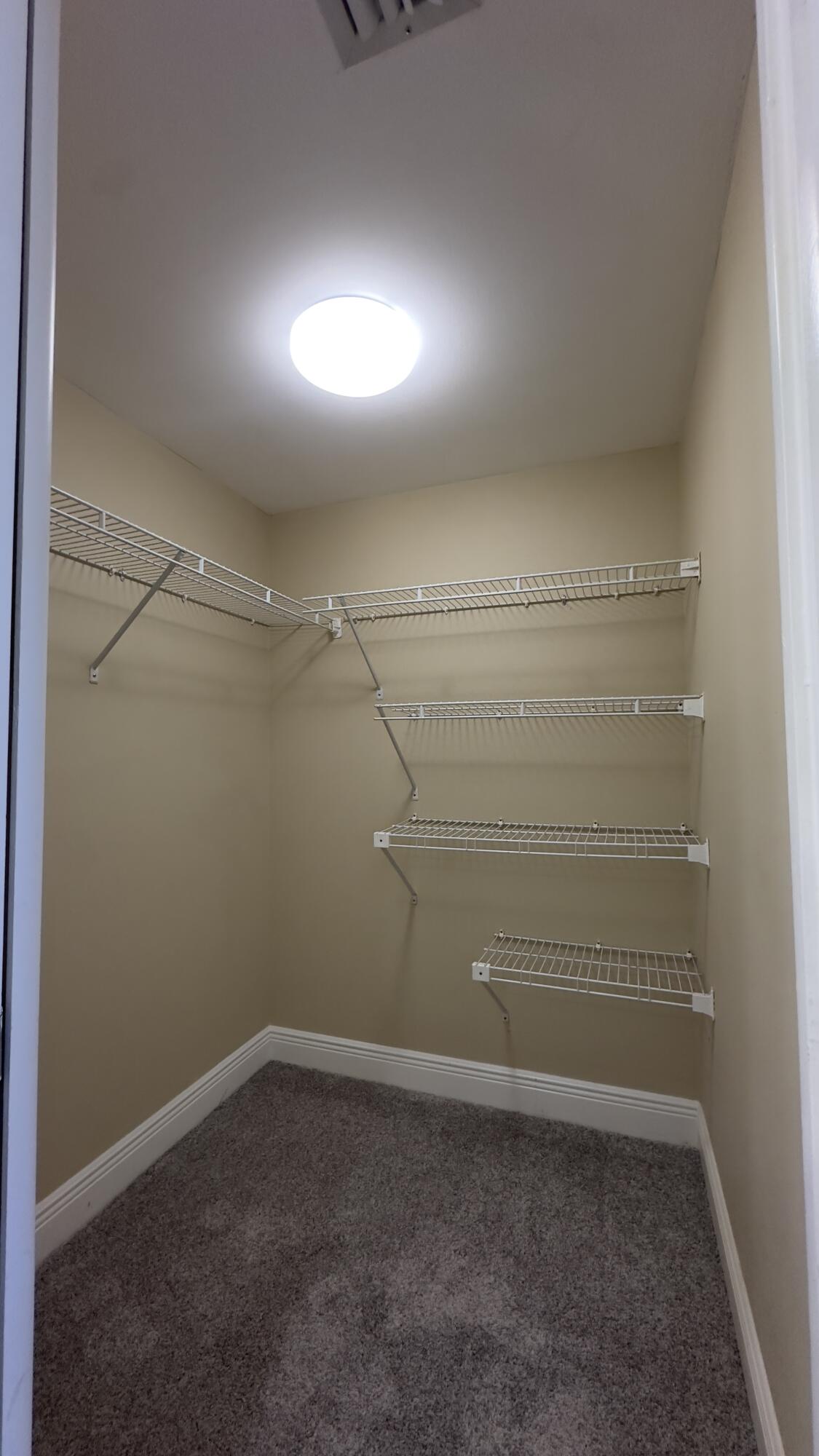 2425 Presidential Way, Unit 203 West Palm Beach, FL 33401 - Photo 18 of 35 a view of empty room