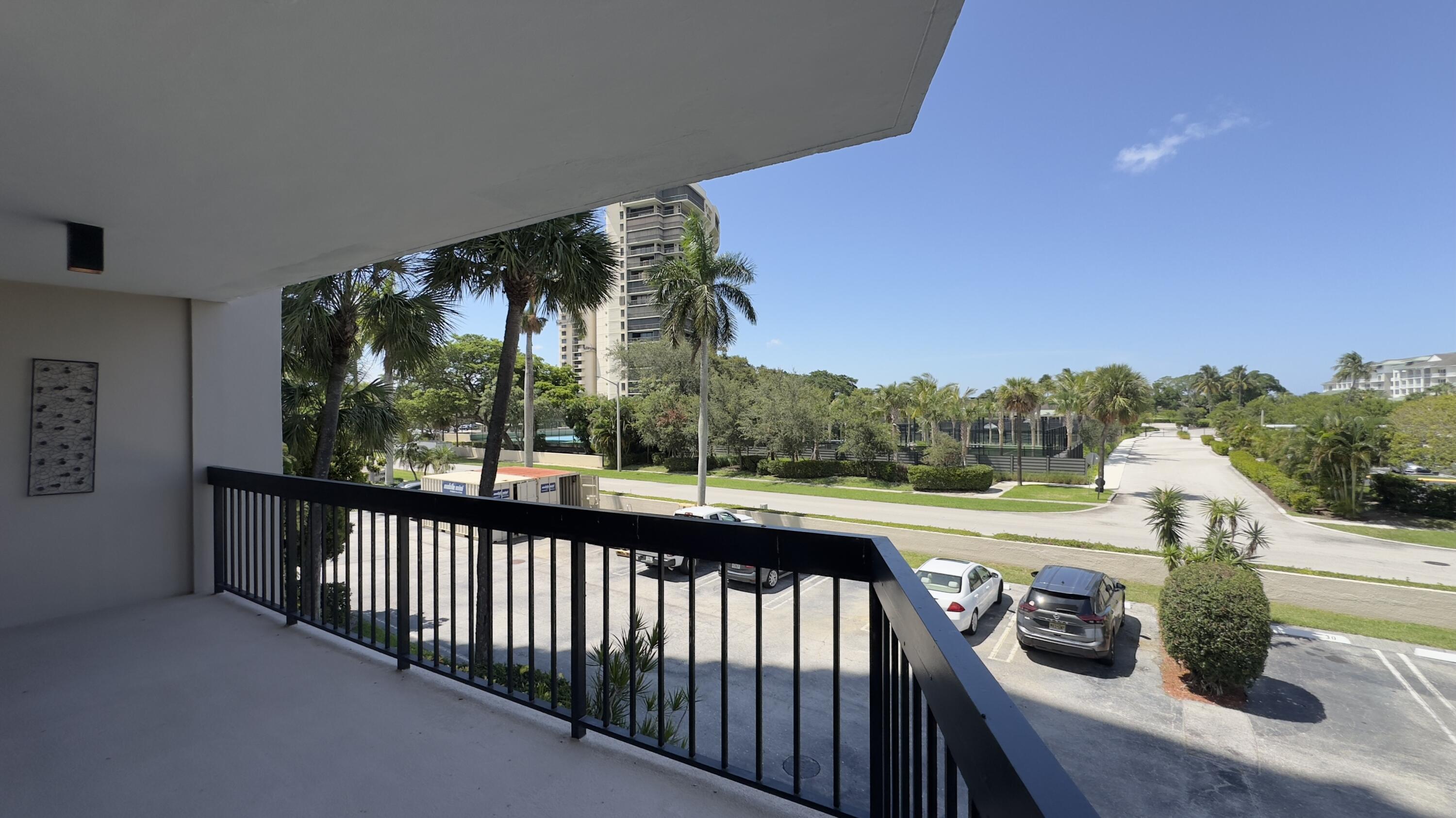 2425 Presidential Way, Unit 203 West Palm Beach, FL 33401 - Photo 23 of 35 a view of a city from a balcony