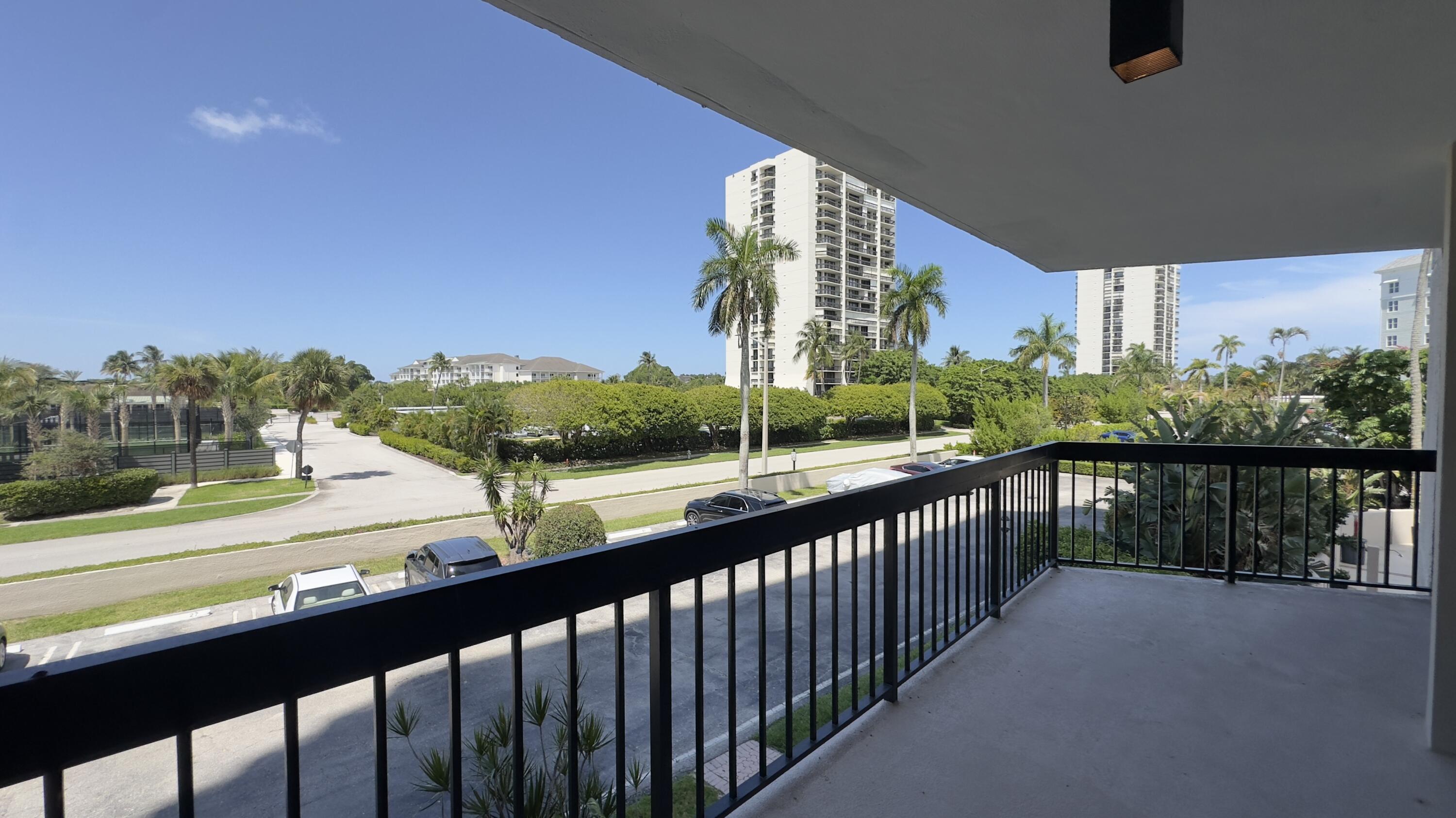 2425 Presidential Way, Unit 203 West Palm Beach, FL 33401 - Photo 24 of 35 a view of city from balcony