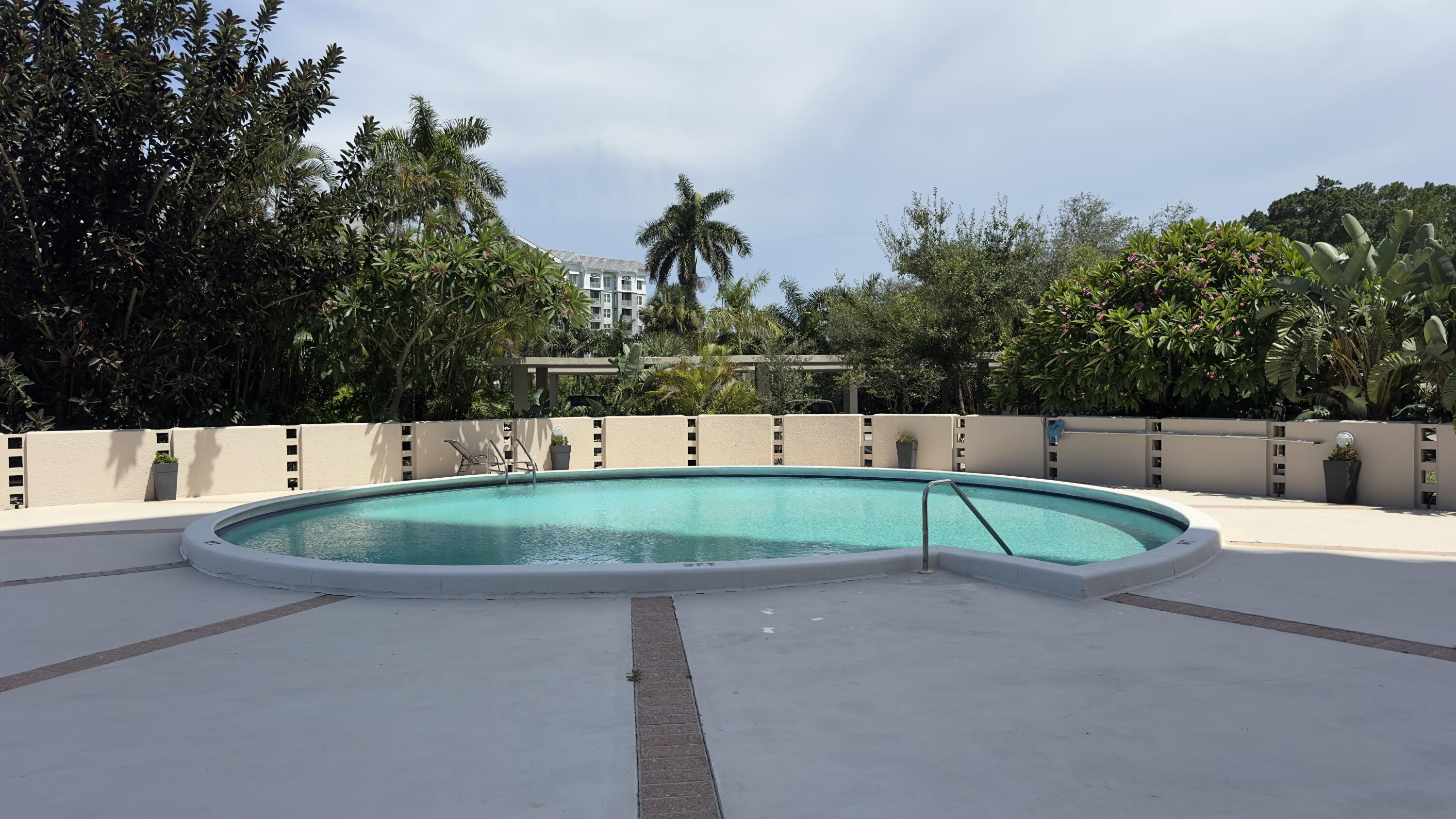 2425 Presidential Way, Unit 203 West Palm Beach, FL 33401 - Photo 26 of 35 a view of outdoor space and yard