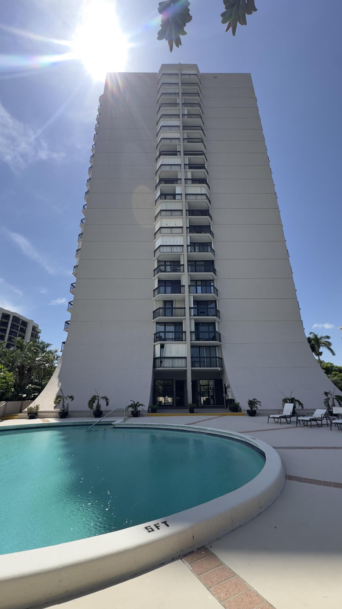 2425 Presidential Way, Unit 203 West Palm Beach, FL 33401 - Photo 27 of 35 a front view of a building