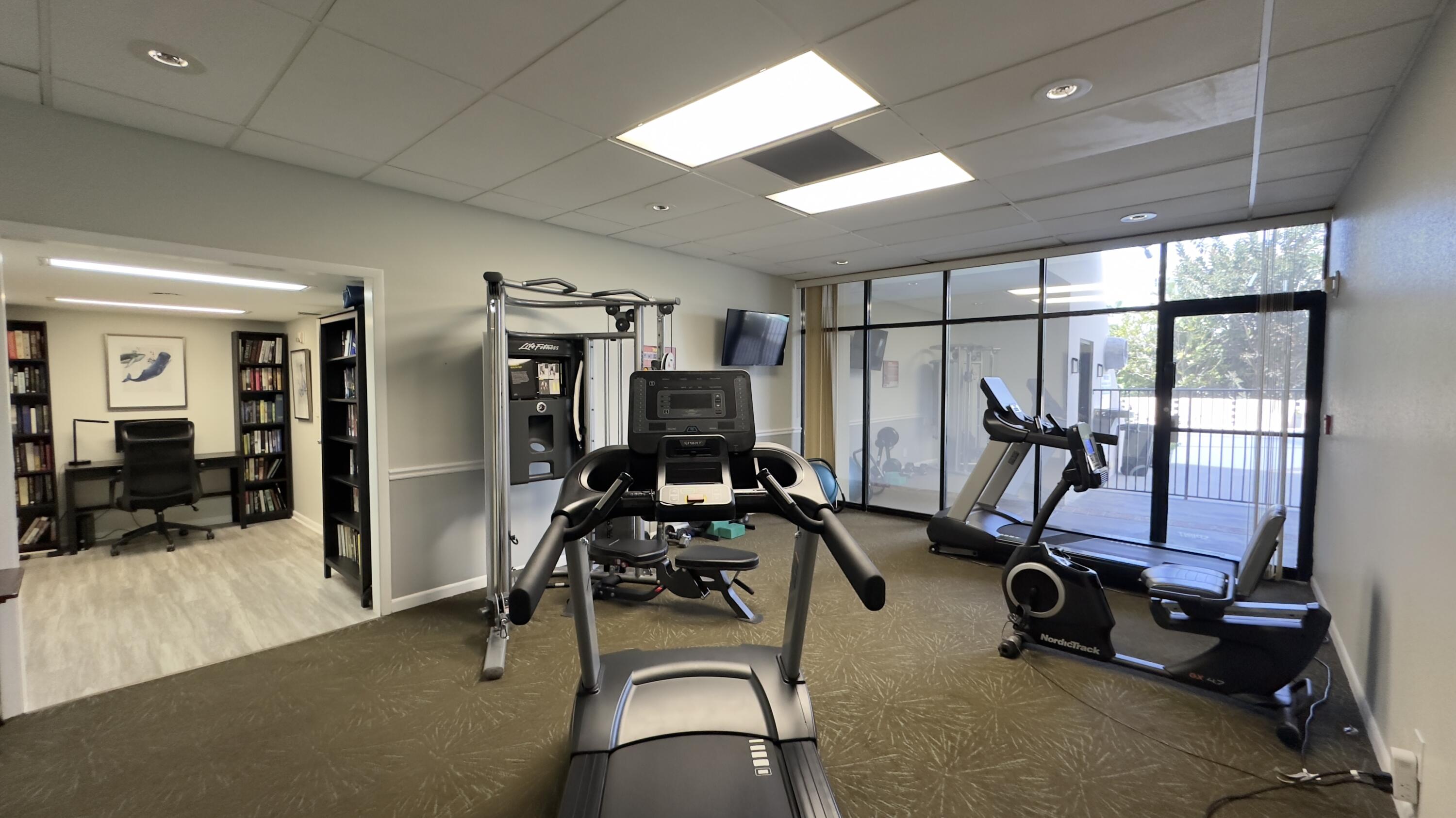 2425 Presidential Way, Unit 203 West Palm Beach, FL 33401 - Photo 30 of 35 a view of a room with gym equipment