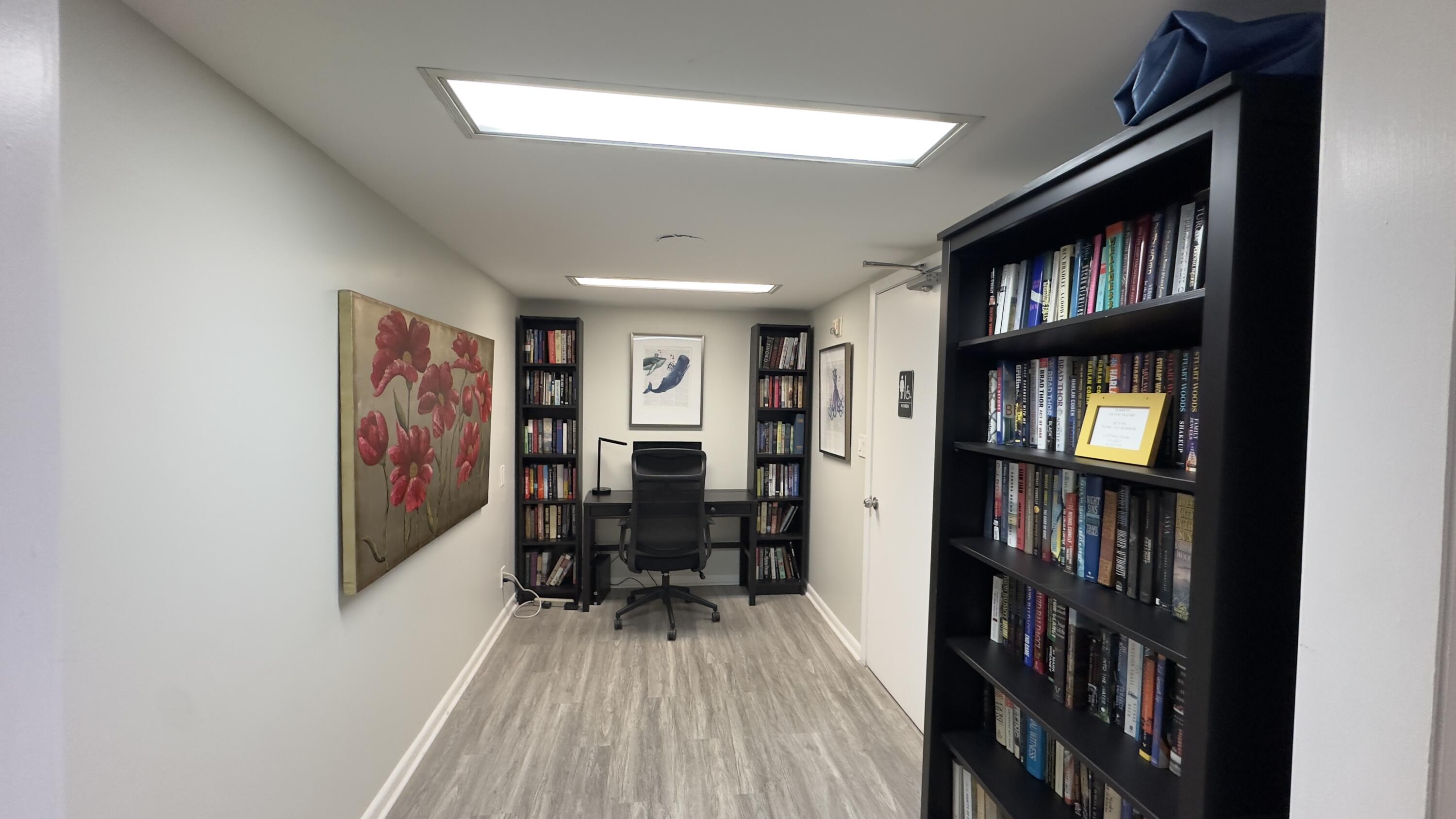 2425 Presidential Way, Unit 203 West Palm Beach, FL 33401 - Photo 32 of 35 a view of front door with workspace