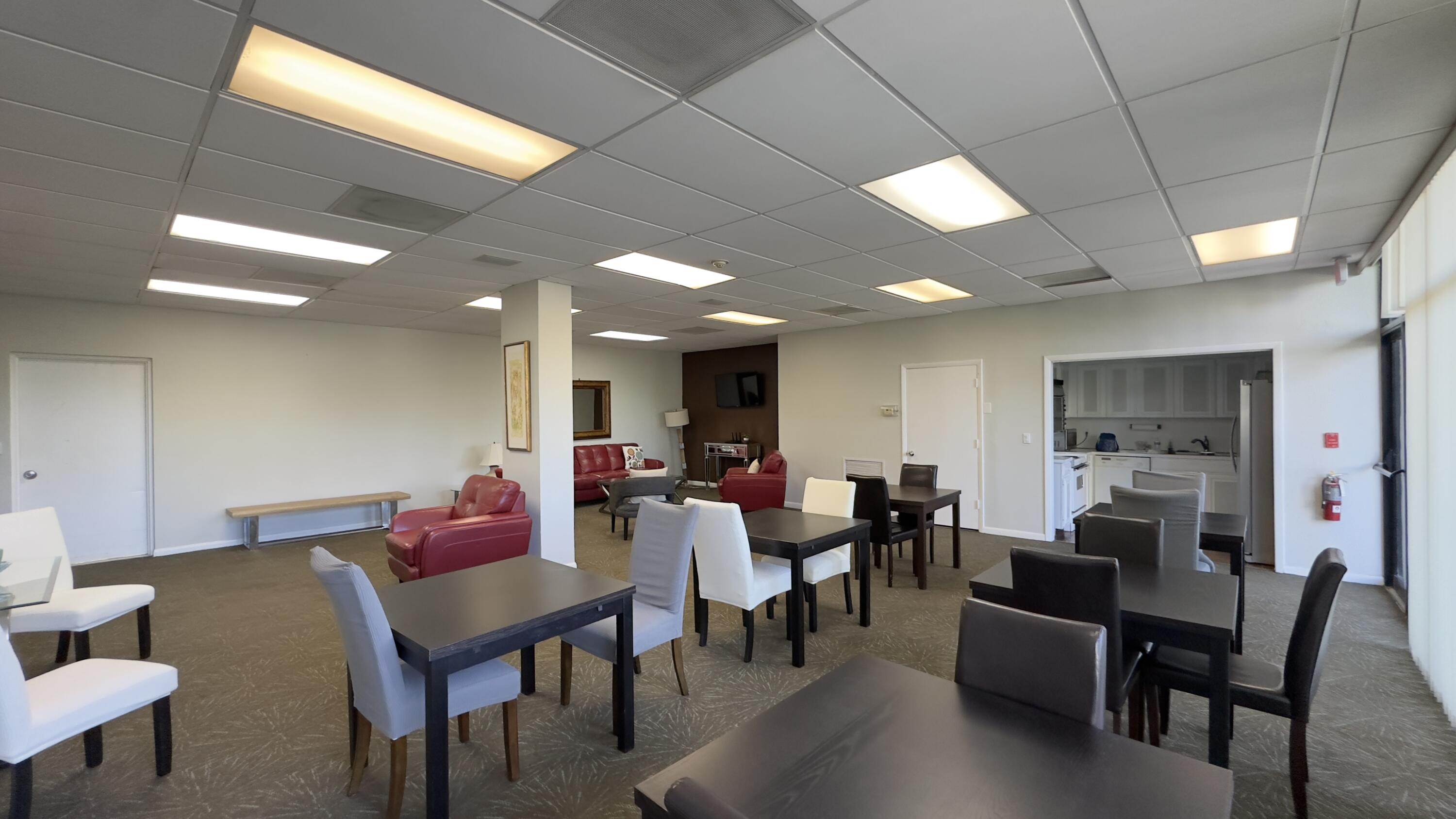 2425 Presidential Way, Unit 203 West Palm Beach, FL 33401 - Photo 33 of 35 a view of a dining room with furniture
