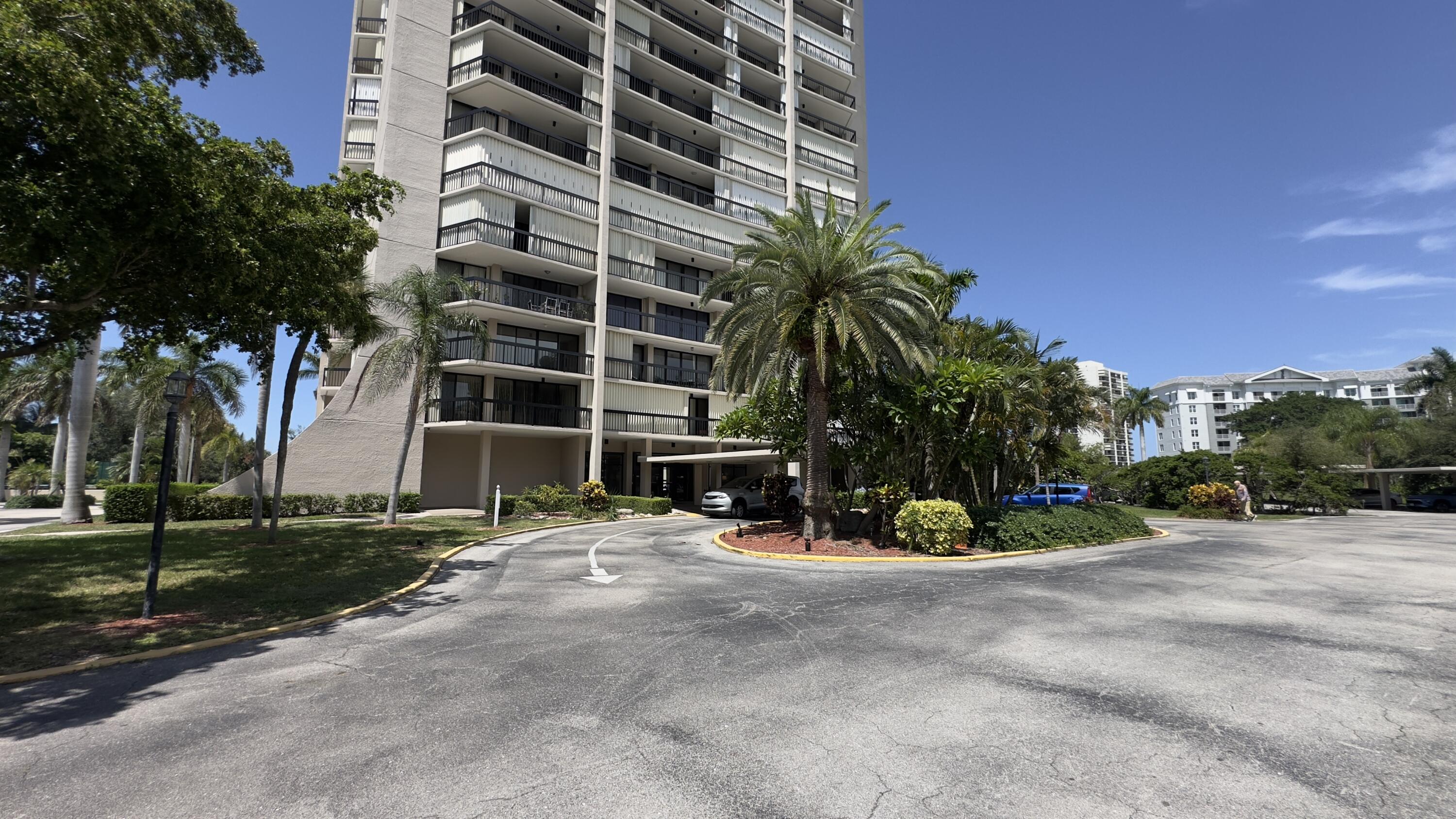 2425 Presidential Way, Unit 203 West Palm Beach, FL 33401 - Photo 35 of 35 front view of a building with a view of a building