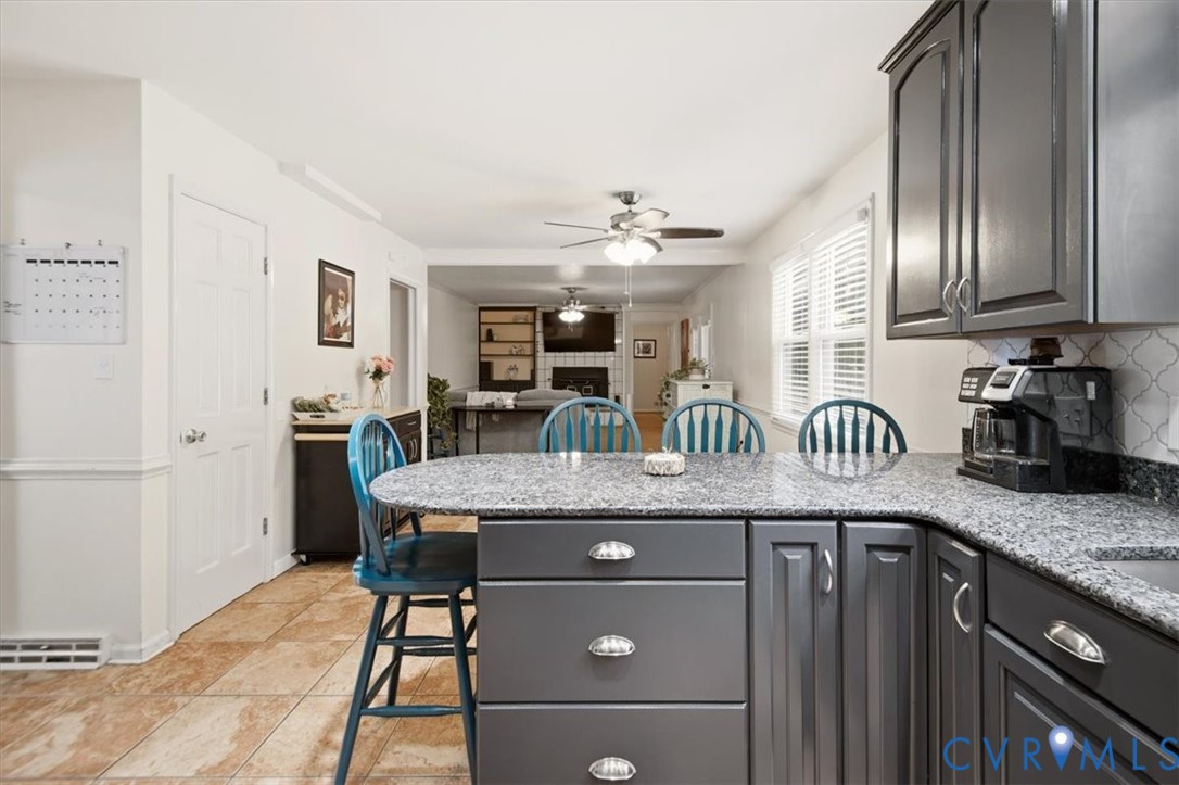 4508 Ridgecrest Lane Colonial Heights, VA 23834 - Photo 15 of 52 Kitchen featuring gray cabinetry, granite countert