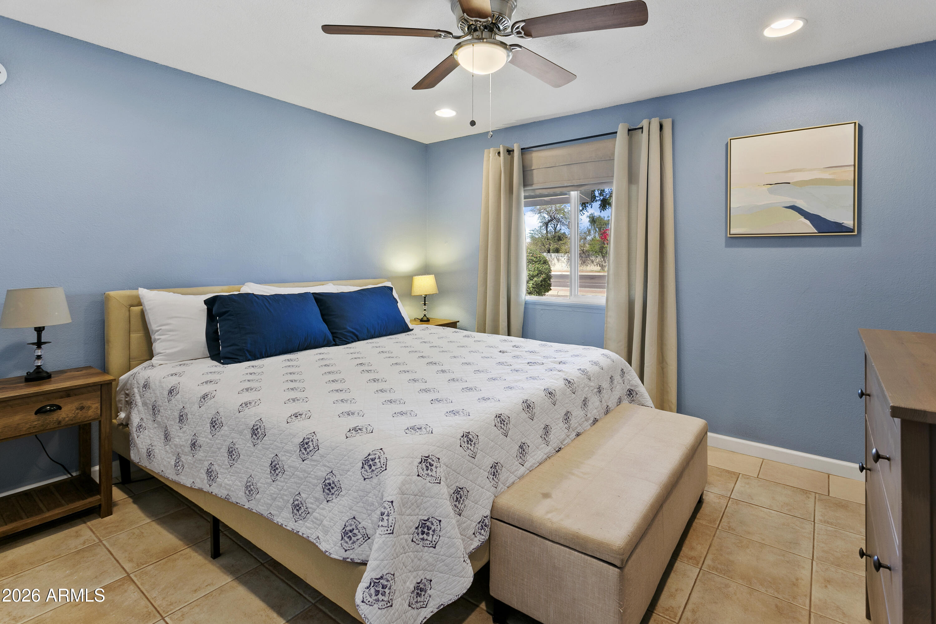 3445 East Thunderbird Road Phoenix, AZ 85032 - Photo 20 of 35 a bedroom with a bed and window