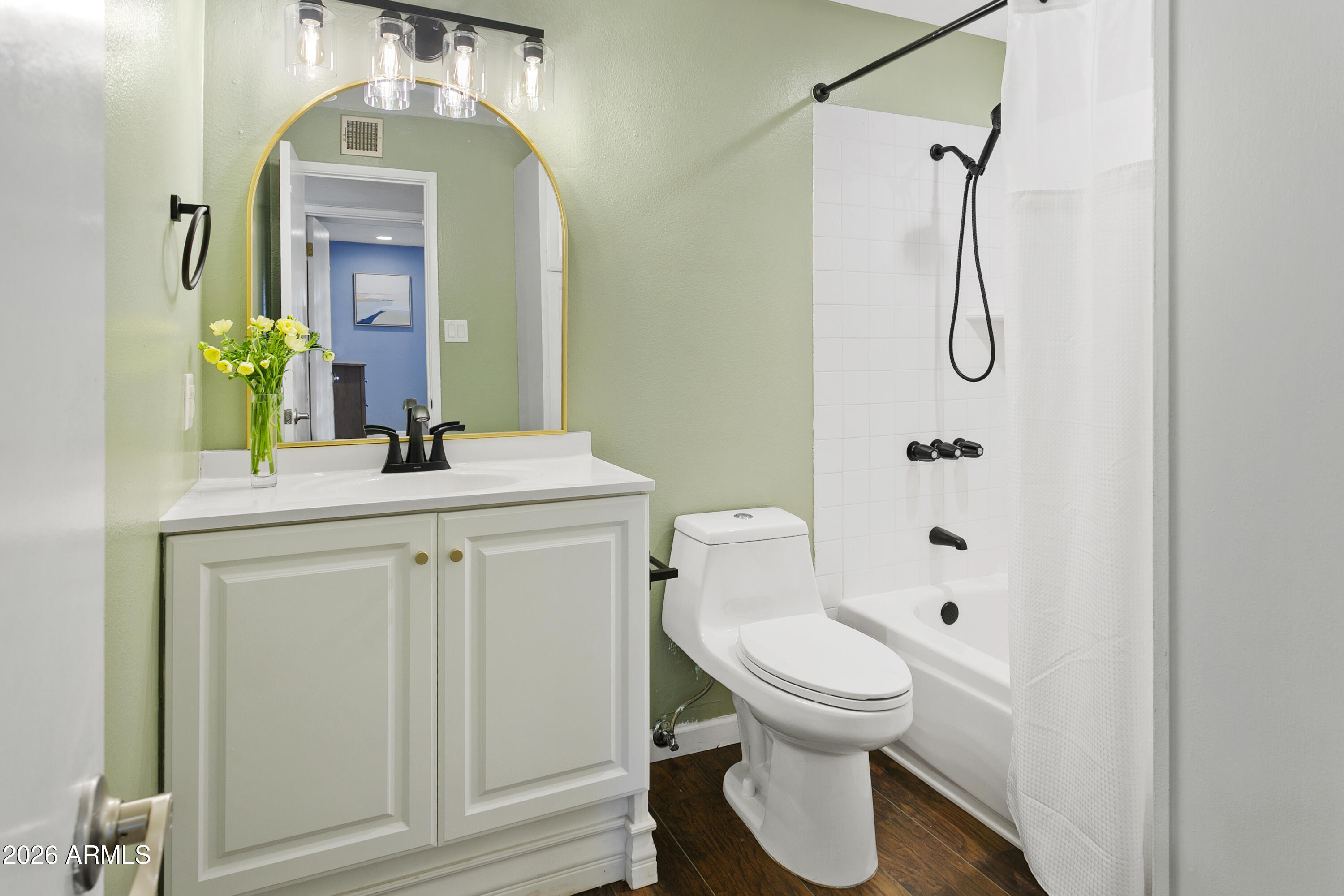 3445 East Thunderbird Road Phoenix, AZ 85032 - Photo 22 of 35 a bathroom with a sink a toilet and shower