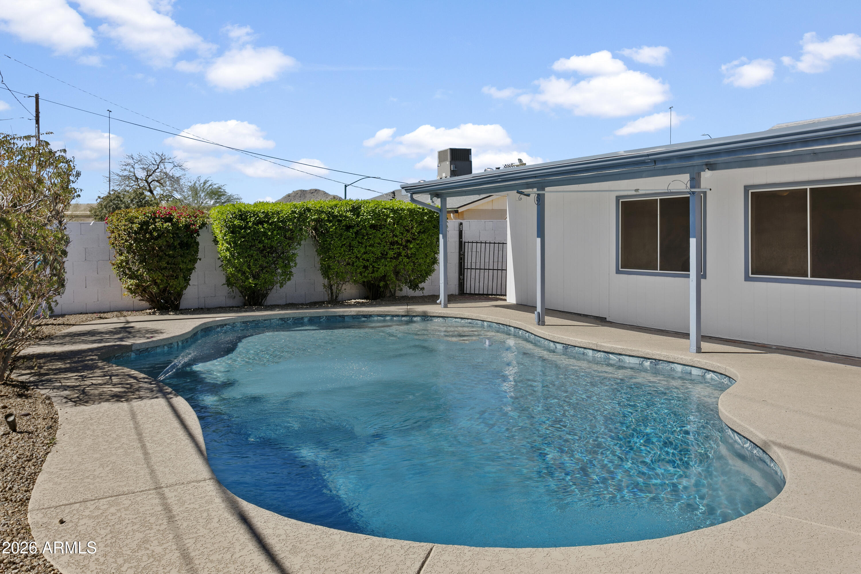 3445 East Thunderbird Road Phoenix, AZ 85032 - Photo 27 of 35 a view of a house with a backyard