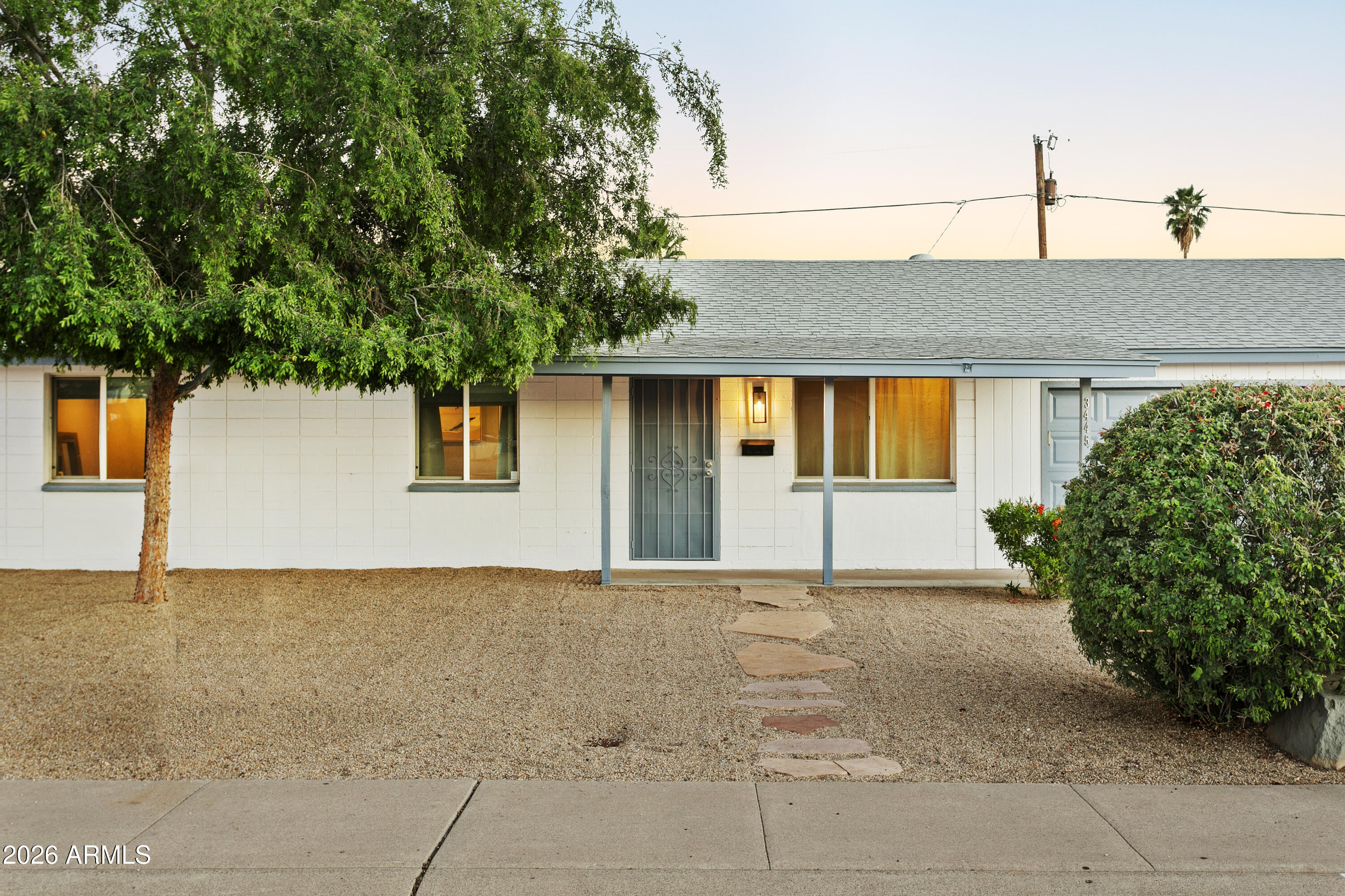 3445 East Thunderbird Road Phoenix, AZ 85032 - Photo 3 of 35 a view of a house with a garage
