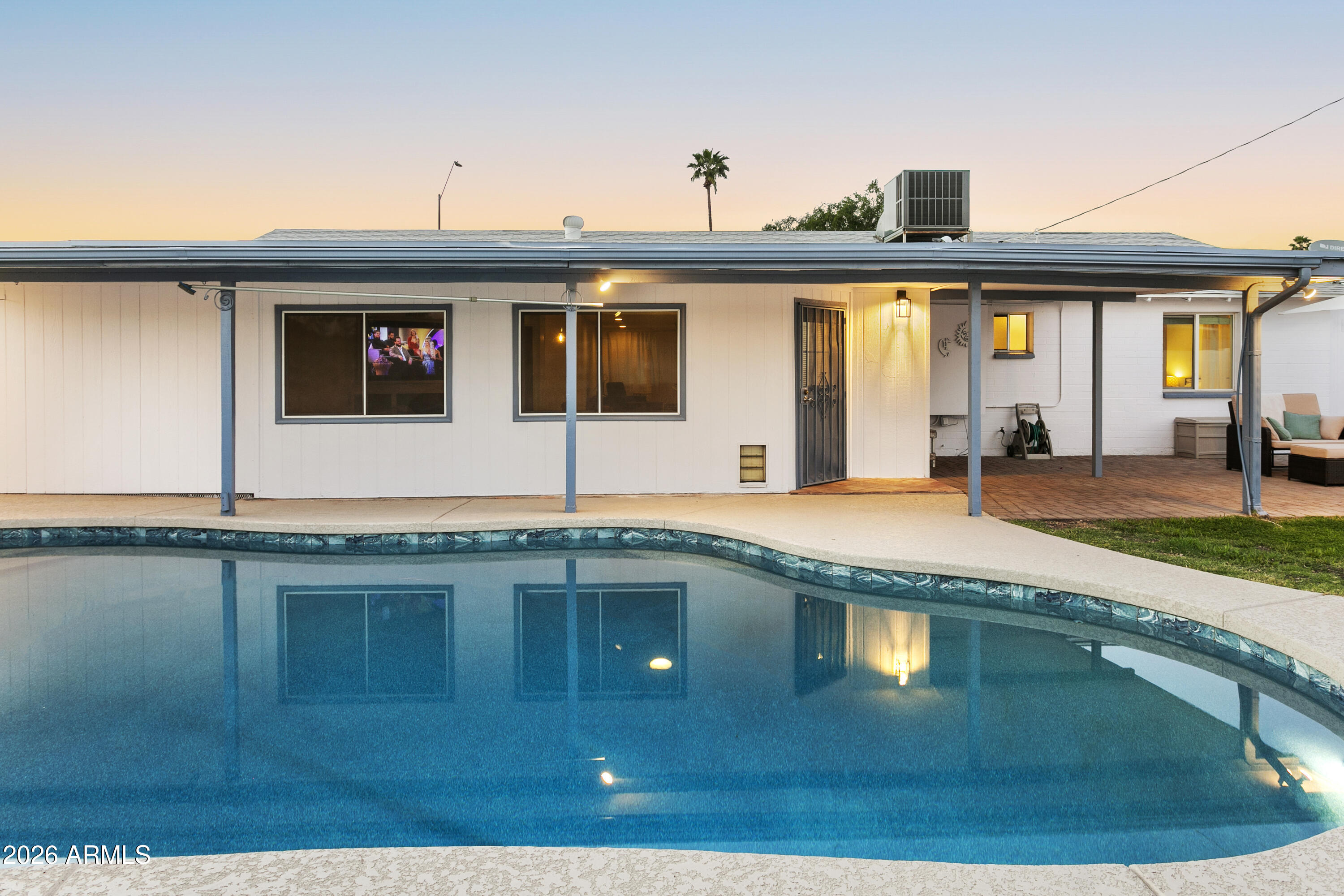 3445 East Thunderbird Road Phoenix, AZ 85032 - Photo 31 of 35 a swimming pool with outdoor seating